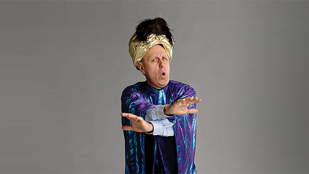 Lead Guru Don Runge Purple Robe Headdress Hands Crossed Banner 2048x1152